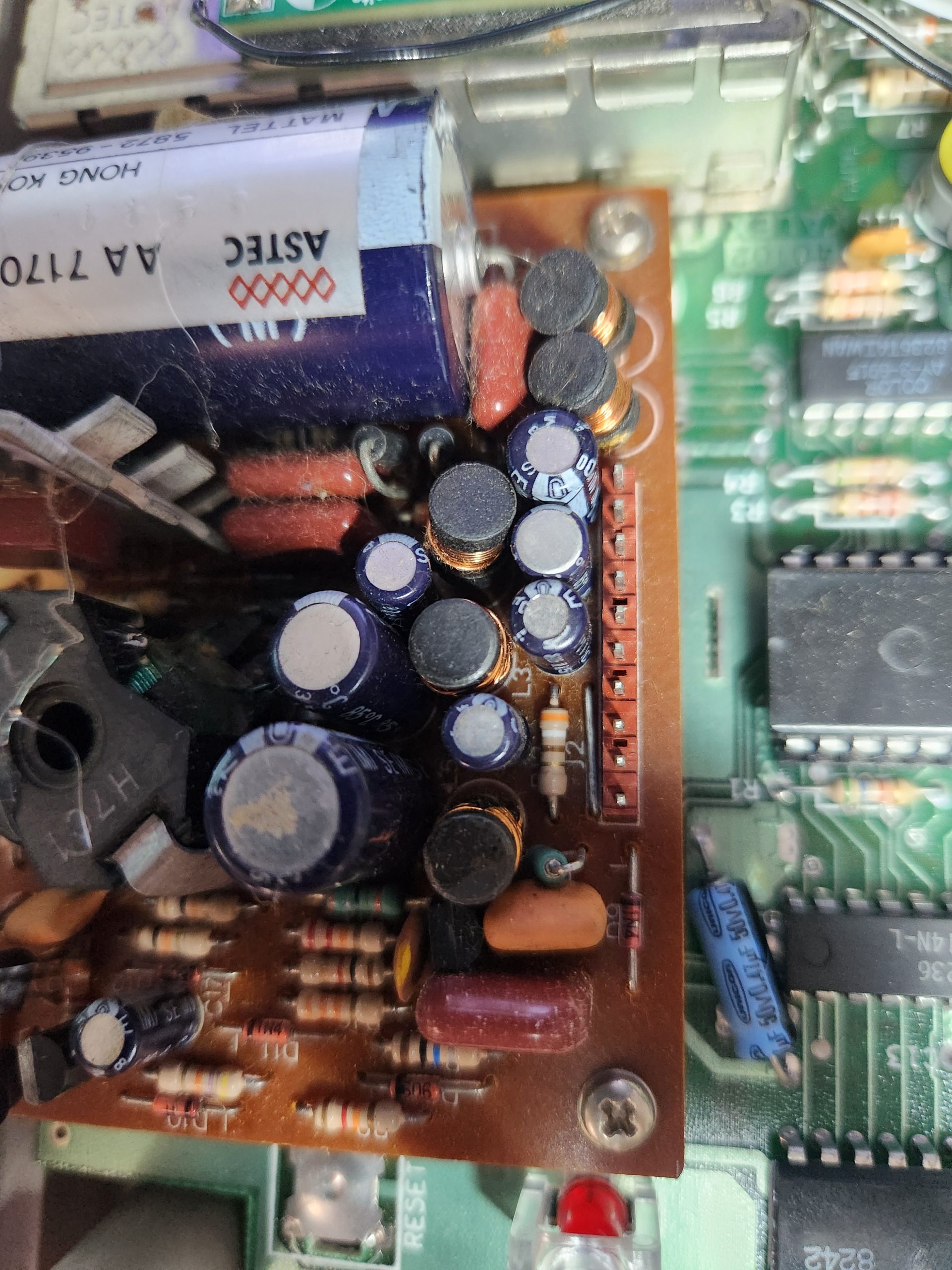 Close-up of the capacitors on the Astec power board