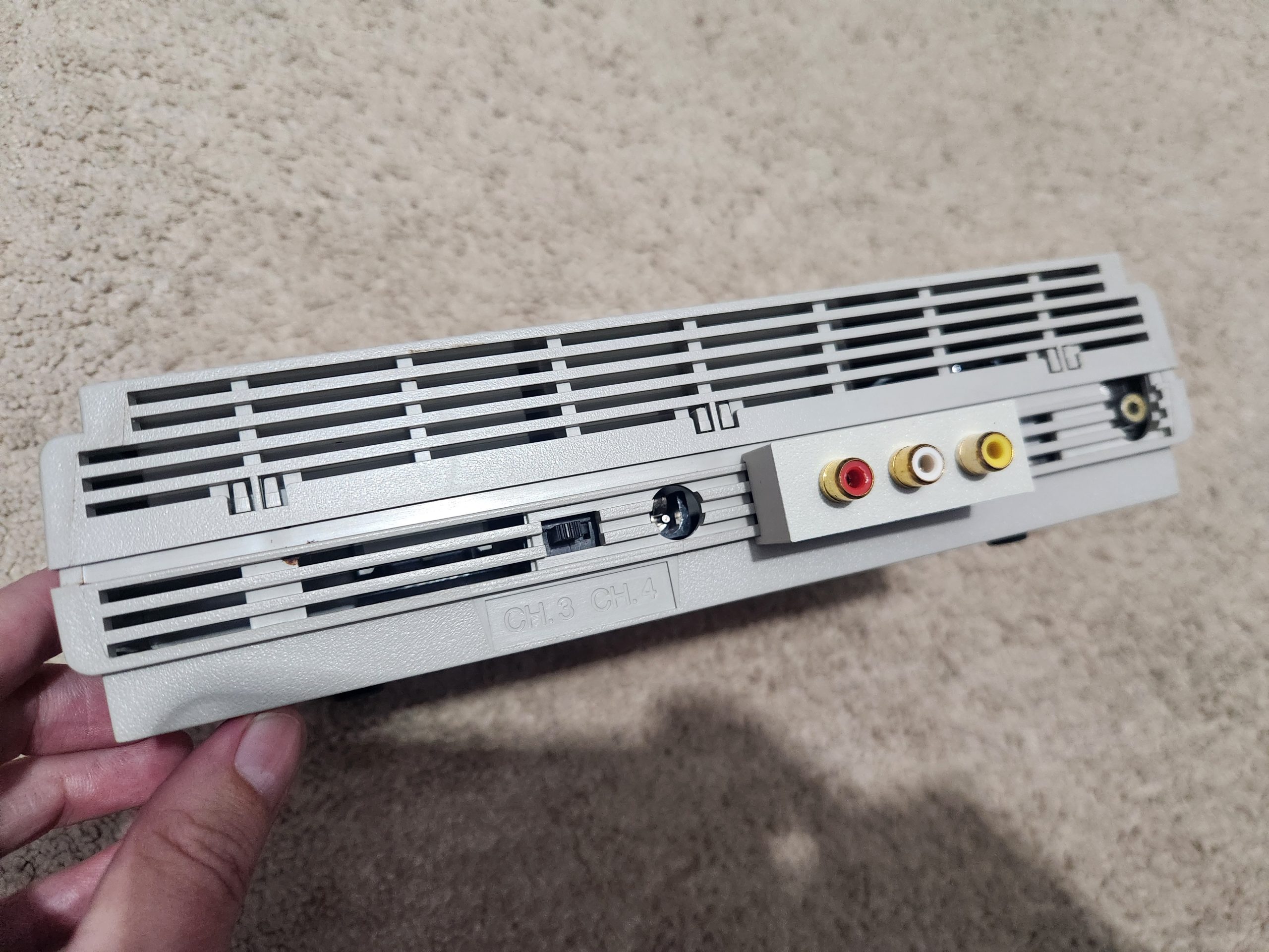 Rear of the Intellivision II with the new red, white, and yellow RCA jacks next to the original RF output